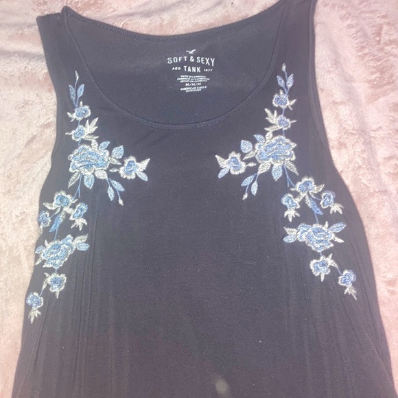 Soft and flowy tank top. Pretty with flowered imbedded on it - Picture 2 of 2